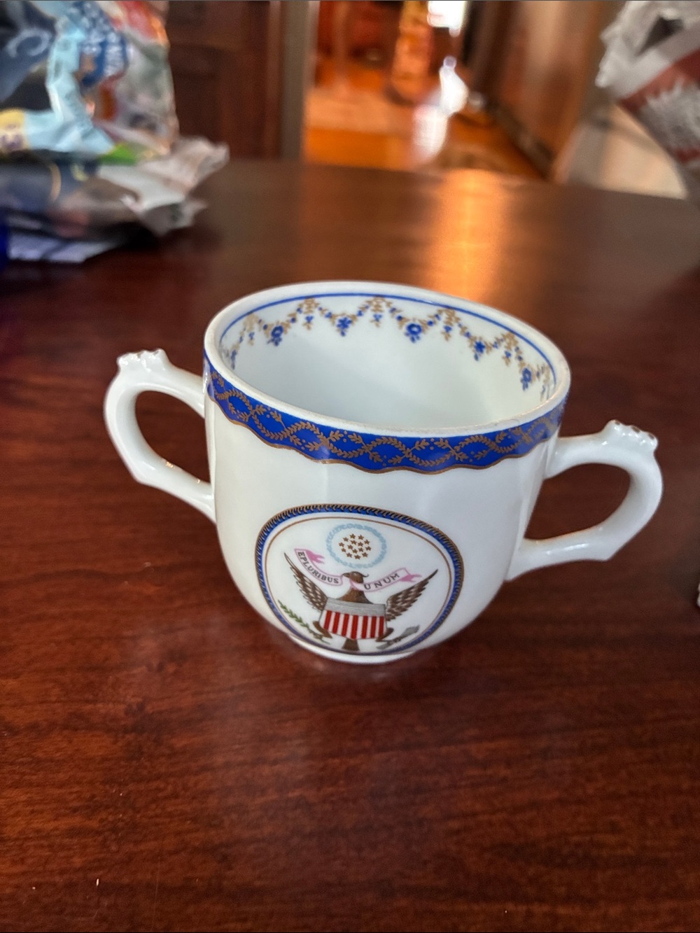 1975 Limoges Chinese Export Armorial US Presidential Great Seal handled cup.